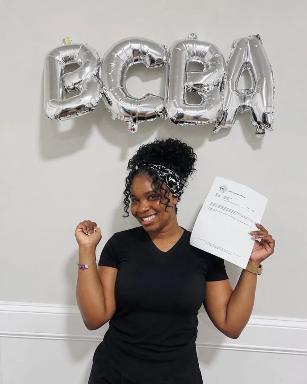 A BlueAsh fellow celebrating after passing the BCBA exam